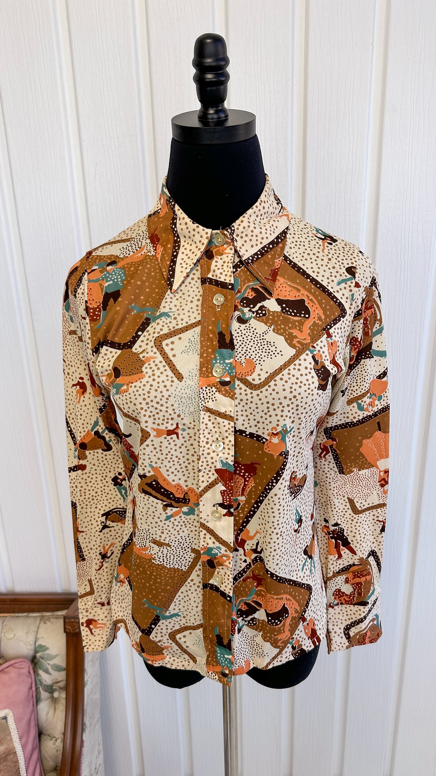 Beige blouse with skater patterns - small